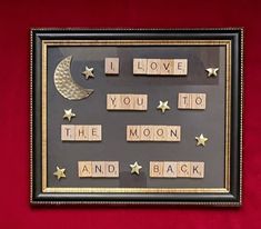 scrabble tiles spelling out the words i love you to the moon and back