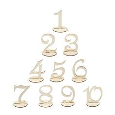 a wooden christmas tree with numbers in it