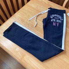 Aeropostale Navy With White Stripes Down The Legs.Drawstring Ties At The Top. 57% Cotton, 38% Polyester And 5% Spandex. Skinny Fit Stretch Fleece. Size X-Small Brand New With Tags Aeropostale Outfits 2000s, Aeropostale Sweatpants, Aeropostale Outfits, Aeropostale Set, Vintage Aeropostale, Navy Blue Chinos, Plaid Dress Pants, Y2k Fits, Aeropostale Shirts