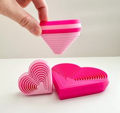 Here is a fidget toy you are sure to love ❤ The small heart would be a perfect toy for a valentine exchange in school:) These are digital files only. Purchase includes STL file for:  (1) Large Heart Layered Fidget   (2) Small Heart Layered Fidget 3D PRINTING SETTINGS: Layer Height 0.2mm PLA works great 15-20% Infill  Dimensions of Large Heart Layered Fidget: 4in x 4in x 7/8in Dimensions of Small Heart Layered Fidget: 2 3/8in. X 2 3/8in. X 7/8in. You could scale up on these but I would caution about scaling down too much because that will make the walls thinner and decrease the spacing between the layers resulting in a less satisfying fidget. Have fun printing:) Cool 3d Prints, 3d Printing Toys, Drukarka 3d, 3d Printer Files, 3d Printing Art, 3d Printer Designs, 3d Printing Diy, 3d Printer Projects, 3d Printing Projects