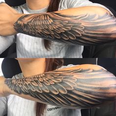 the arm is covered in black and grey tattoos with wings on it's arms