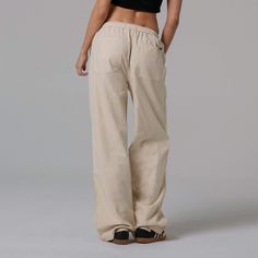 Meet your new go-to. Our Paneled Pant seamlessly blends comfort with style. Made from a durable yet breathable fabric, these pants offer a relaxed fit with a modern, tapered leg. 55% Cotton, 45% Tencel 235 GSM True to size Relaxed Fit Cotton Wide Leg Pants Athleisure, Versatile Cotton Parachute Pants For Loungewear, Solid Cotton Wide Leg Leisure Pants, Cotton Wide Leg Pants For Leisure, Solid Cotton Wide Leg Pants For Leisure, Relaxed Baggy Straight Leg Sweatpants, Sporty Cotton Wide Leg Pants With Loose Fit, Sporty Cotton Wide Leg Pants With Loosely Fitted Hips, Casual Wide Leg Leisure Pants