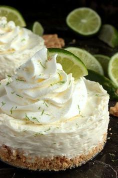 a close up of a cake on a plate with limes