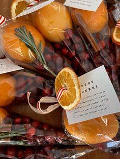 oranges wrapped in cellophane and labeled with stop pourri's candy canes