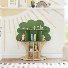 a children's book shelf with books and toys on it