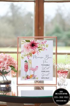 a table with flowers and wine glasses on it