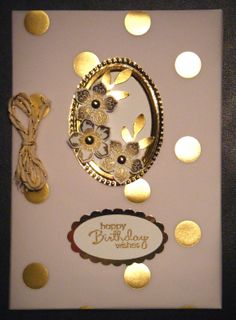 a birthday card with gold confetti and flowers on it, surrounded by polka dots