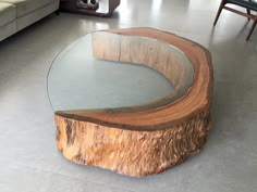 a wooden table with glass top in a living room