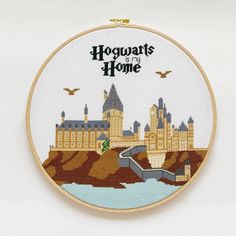 the hogwart's home cross stitch pattern is shown in front of a white background