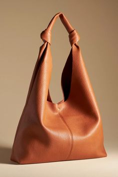 The Love Knot Slouchy Bag | Anthropologie Fall Winter Capsule Wardrobe, Anthropologie Bags, Slouchy Tote, Slouchy Bag, Minimalist Accessories, Oversized Bag, Oversized Tote, Faux Leather Bag, Love Knot