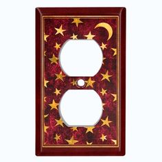 a red and gold light switch cover with stars on the bottom, and a crescent in the middle