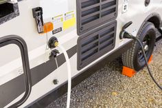 an electric vehicle is plugged into the charger