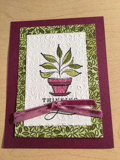 a handmade card with a plant on it