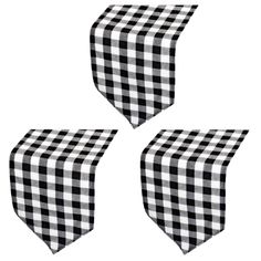 three black and white checkered table cloths