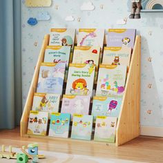 there are many children's books on display in this child's book rack