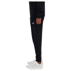 Whether you're headed to the gym, taking a jog, or unwinding after exercise, these versatile, staple active lifestyle trousers are the essential choice for you. They feature NB DRY fast-drying technology, which wicks moisture from your body for that drier, more comfortable feeling, with other key features ranging from an adjustable drawcord to handy pockets. Pant Trousers For Men, After Exercise, New Balance Men, Shoe Size Conversion, Us Man, Knit Pants, Men Shoes Size, Active Lifestyle, Male Body