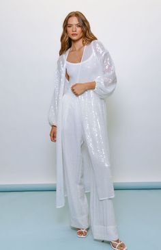 Maxi length cover-up Long sleeve Sheer fabric Tie at waist for closure Fabric: Sequin Mesh HPS: 51" Dry clean only Plus Swim, Fitted Gowns, White Maxi, Dry Clean Only, Swimwear Cover Ups, Sheer Fabric, Swimwear Cover, Sheer Fabrics, Dress Romper