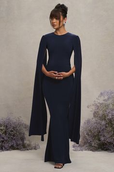 Classy Maternity Outfits, Black Wedding Guest Outfits, Dress With Cape Sleeves, Maternity Dress Wedding Guest, Elegant Maternity Dresses, Dress With Cape, Long Cape, Sleek Bun, Maternity Maxi Dress