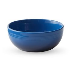 a blue bowl on a white background