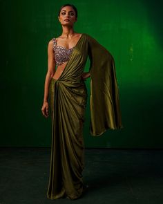 Olive Green Indo Western Wrap Saree with Drape Sleeves - A Stylish Fusion of Uncommon Indo Western Saree Draping Styles, Perfect for Party Wear and Weddings.Explore a distinctive look with our Olive Green Indo Western Wrap Saree featuring drape sleeves, showcasing the artistry of uncommon saree draping styles. Embrace the fusion of Western and traditional with this uniquely styled saree, offering a chic Western look with a touch of elegance. Ideal for parties, weddings, and special occasions, th Western Saree Draping, Unique Saree Draping, Wrap Saree, Western Saree, Indo Western Saree, Flower Power Fashion, Draping Styles, Saree Draping Styles, Saree Draping