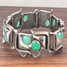 Antonio Pineda Taxco Mexico Sterling Silver Green Stone Modernist Bracelet Click the link to purchase💰⬇️ #brutalist #bracelet #modernist #jewelry #vintage #affiliate #ad Taxco Silver Jewelry Vintage, Modernist Bracelet, Taxco Silver Jewelry, Mexican Silver Jewelry, Mexican Jewelry, Modernist Jewelry, Green Stone, Jewelry Vintage, Anton