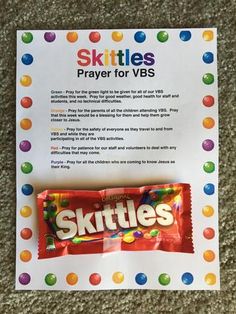 skittles prayer for vbs in front of a sign on the floor that says skittles