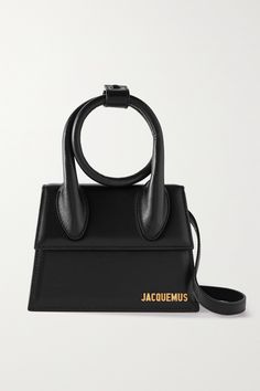 Jacquemus' cult 'Le Chiquito' bags are  never  in stock for long, so you won't want to leave this one lingering in your wish list. Made from smooth leather, it has a structured shape, artfully twisted handle and a longer shoulder strap. Match any jewelry to the gold designer lettering. Bag Jacquemus, Jacquemus Bags, Jacquemus Le Chiquito, Hidden Tattoos, Christmas Haul, Jacquemus Bag, Aesthetic Bags, Dream Bags, Statement Bag