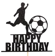 a birthday cake topper with a soccer player on it