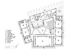 an architectural drawing shows the ground plan for a building with multiple floors and two levels