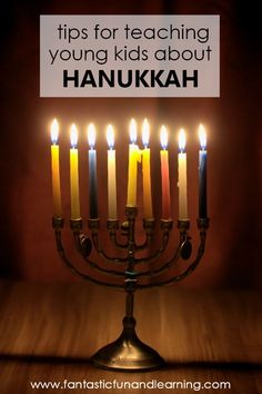 a hanukkah menorah with lit candles in it and the words tips for teaching young kids about hanukkah