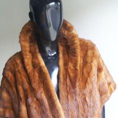 Beautiful Vintage 1950s Brown Fur Shawl! Beautiful Pelt, With An Exquisite Fit. Hidden Pockets At Each Side Of The Waist. Brown Color, With Coffee Black Stripes. Fully Llind. Can Easily Transition From Day To Night. Great With Jeans, Yet Perfect Over A Dress, Or Gown. In Great Condition. Measures 21 Inches From Shoulder To Shoulder. Will Fit Most Sizes. Fur Capelet, Brown Fur Shawl, Vintage Mink-colored Formal Outerwear, Vintage Brown Outerwear With Faux Fur Trim, Retro Brown Faux Fur Coat, Brown Luxury Long-sleeve Fur Coat, Vintage Brown Faux Fur Outerwear, Fur Shawl, Coffee Black