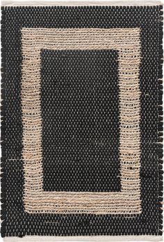 a black and white rug with an area made out of jute, rope and yarn