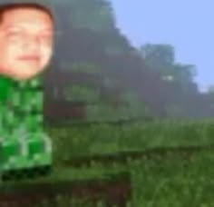 a blurry photo of a man in a green shirt