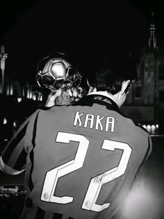 the back of a hockey player's jersey in black and white