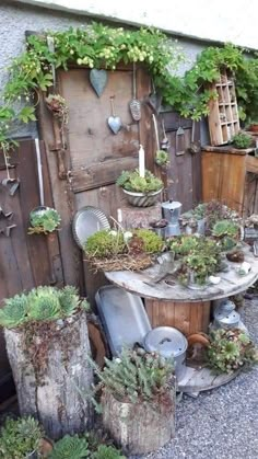 an outdoor garden area with potted plants and pots