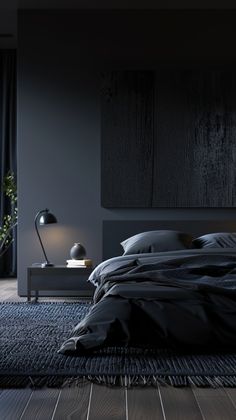 a bedroom with black walls and wooden floors