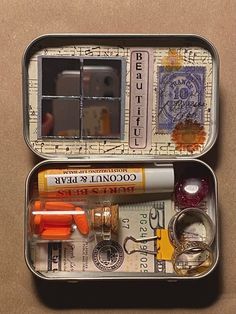 two tins filled with different types of items