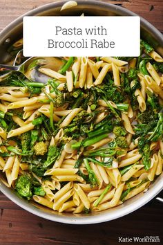 pasta with broccoli in a pan on a wooden table