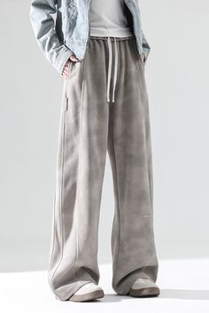 Warmth Meets Relaxed Style Elevate your casual wardrobe with these wide leg sweatpants. Designed for comfort and style, they feature a baggy sweatpants silhouette and a low rise pants fit. Made with soft fleece pants, these grey sweatpants and black sweatpants are perfect for cozy lounging or errands. Style #: WWAJ058 Pleated Skirt Winter, Silk Dress Pants, Duster Cardigan Sweater, Low Rise Pants, Baggy Sweatpants, Cardigan Sweater Vest, Wide Leg Sweatpants, Real Leather Jacket, Black Sweatpants