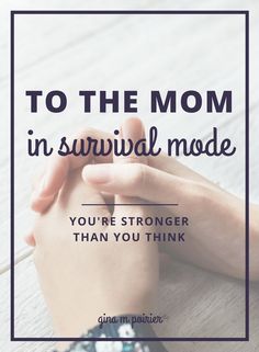 two hands holding each other with the text to the mom in survival mode you're stronger than you think