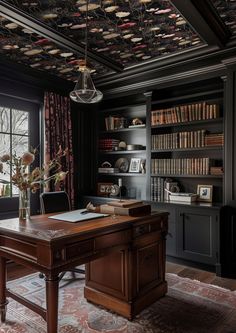 an office with black walls and wooden desks, bookshelves, and large windows