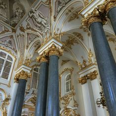 an ornate building with gold and blue columns