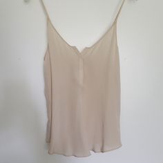 Rory Beca Silk Camisole Blouse Size Xs 100% Silk Best Way To Describe Color Is Beige Or Champagne Or Vanilla. It's Not White Or Ivory. New Without Tags Elegant Camisole With Tank Straps For Day Out, Feminine Sleeveless Blouse Camisole For Day Out, Chic Beige Tops With Tank Straps, Feminine Tank Camisole For Day Out, Beige Camisole Top With Built-in Bra, Chic Beige Camisole With Tank Straps, Beige Camisole Tank Top For Day Out, Chic Tank Strap Top For Day Out, Feminine Cami Top With Built-in Bra