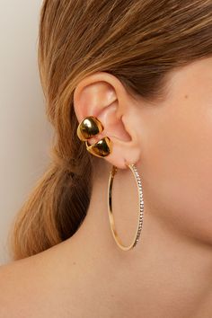 This bold ear cuff features a sculptural design, adding a touch of edge and intrigue to your style. Gold Ear Cuff, Palermo, Ear Cuff, Cuff, Silk, Crystals, Gold