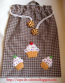 a bag with cupcakes and polka dots on it