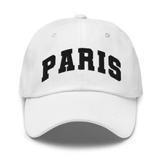 "Add a touch of Parisian flair to your casual or athleisure wear with our embroidered \"Paris\" baseball hat. This stylish and versatile accessory is perfect for both fashion-forward individuals and travel enthusiasts alike. Crafted with care, this hat features high-quality embroidery that showcases the iconic \"Paris\" lettering. The classic baseball hat design is both comfortable and adjustable, ensuring a perfect fit for all-day wear. Whether you're strolling through the streets of Paris or simply want to channel the city's chic style, this hat is a must-have. It effortlessly combines fashion and functionality, making it suitable for various occasions, from weekend outings to outdoor adventures. At VidaLoka, we prioritize quality and customer satisfaction. That's why we've selected prem Sporty Trucker Hat With Curved Brim For College, Curved Bill Hats With Letter Print For College, Trendy Cotton Trucker Hat For Sports, Sporty Baseball Cap For College, Sporty College Baseball Cap, College Baseball Cap With Embroidered Logo, Adjustable Letter Print Baseball Cap For College, Casual College Baseball Cap With Curved Bill, Casual Baseball Cap With Letter Print For Sports