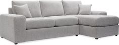 a gray couch with two pillows on it