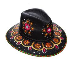 Artisanal Hand-Painted Hats Made in TAXCO, GUERRERO Beautifully hand-painted hats made in Taxco, Guerrero. From their artisanal-hand-painted nature, all designs are unique and one of a kind! Size: One Size (adjustable elastic on the inside) Hand-painted. Measurements: Inside: 24" circumference (elastic gives +/- 1 inch variation)Entire hat: 14.5" long, 13" wide. Made with synthetic material. Painting Hats, Sicilian Decor, Beaded Hats, Hat Painting, Custom Made Hats, Happy Hat, Mexican Hat, Mexican Fashion, Colorful Hat