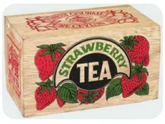 a wooden box with strawberries on it