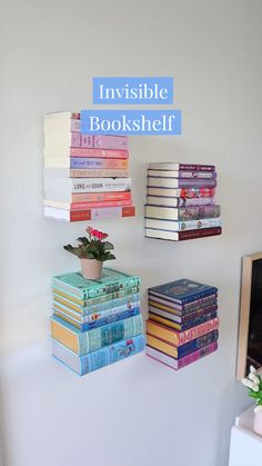 bookshelf with flowers and plants on it in front of a white wall that says invisible bookshelf